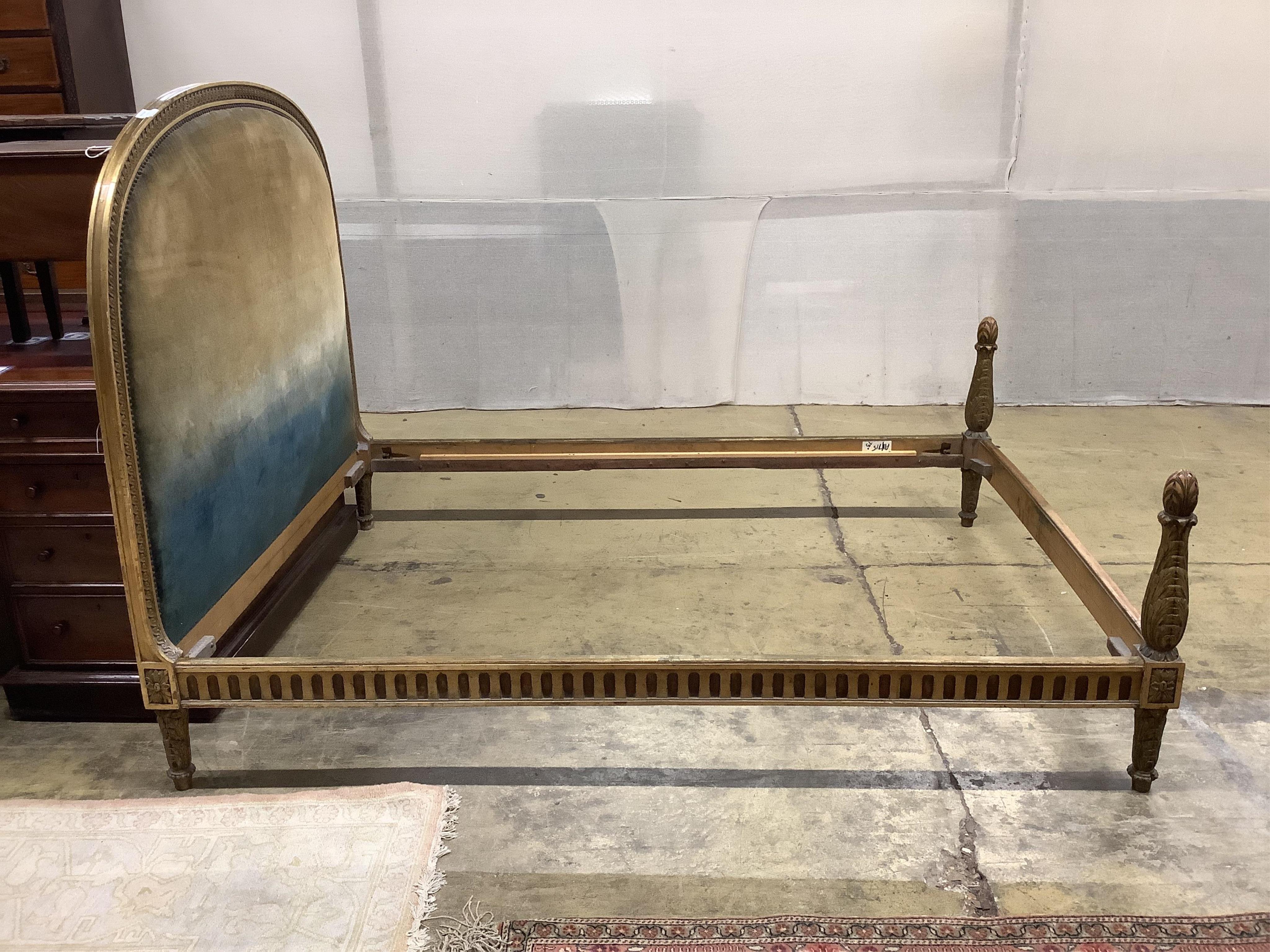 A Louis XVI style carved giltwood and composition bed frame, width 150cm, length 200cm, height 134cm. Condition - fair